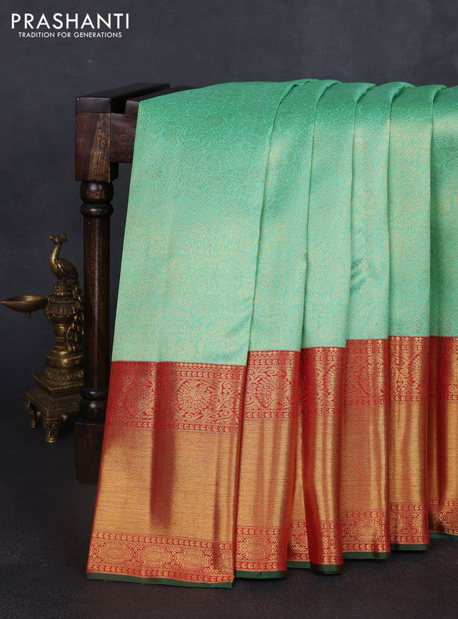 Pure kanchipuram silk saree teal green and red with allover zari woven brocade weaves and long zari woven border