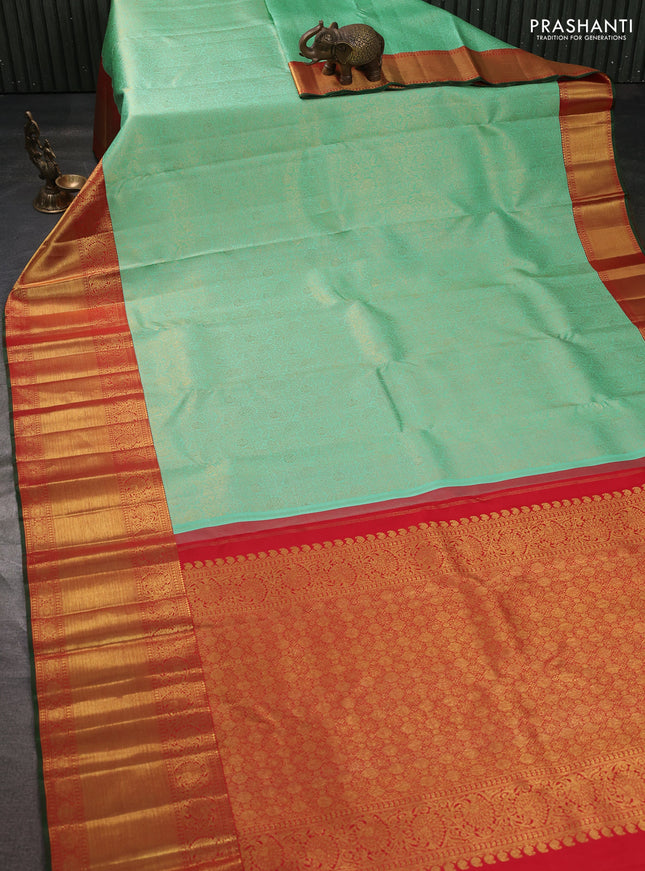 Pure kanchipuram silk saree teal green and red with allover zari woven brocade weaves and long zari woven border