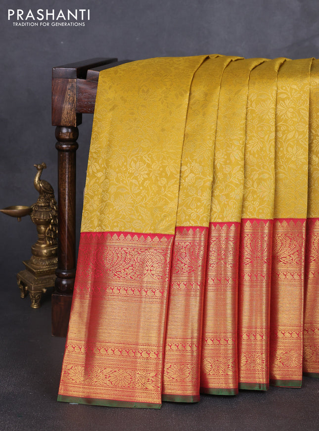 Pure kanchipuram silk saree mustard yellow and pink with allover zari woven brocade weaves and long zari woven border