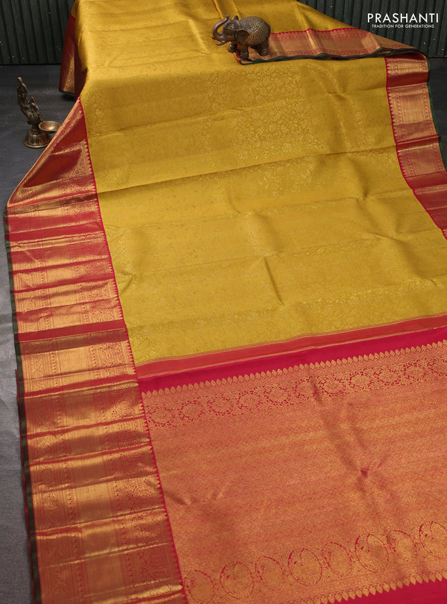 Pure kanchipuram silk saree mustard yellow and pink with allover zari woven brocade weaves and long zari woven border