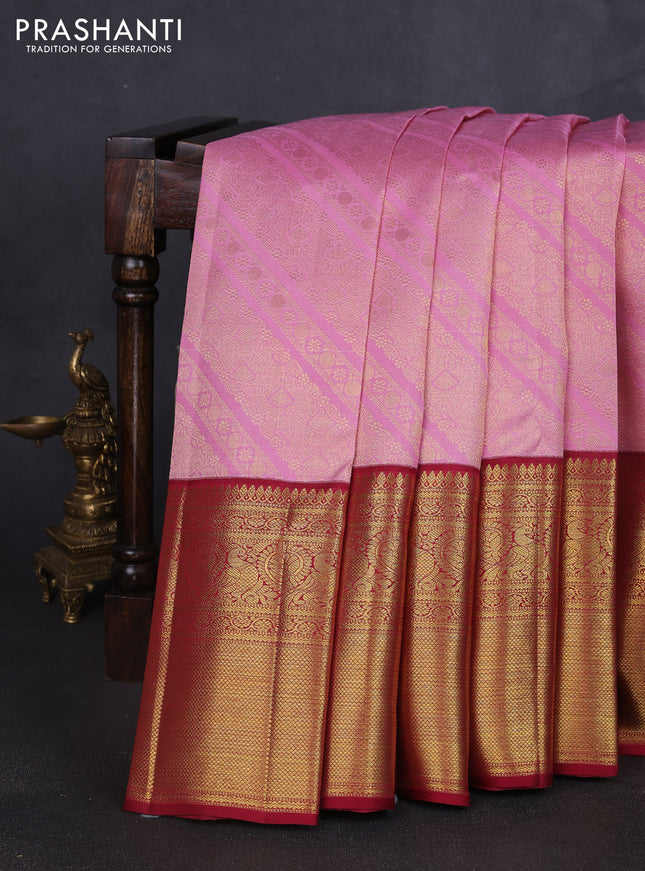 Pure kanchipuram silk saree light pink and maroon with allover zari woven brocade weaves and long zari woven border