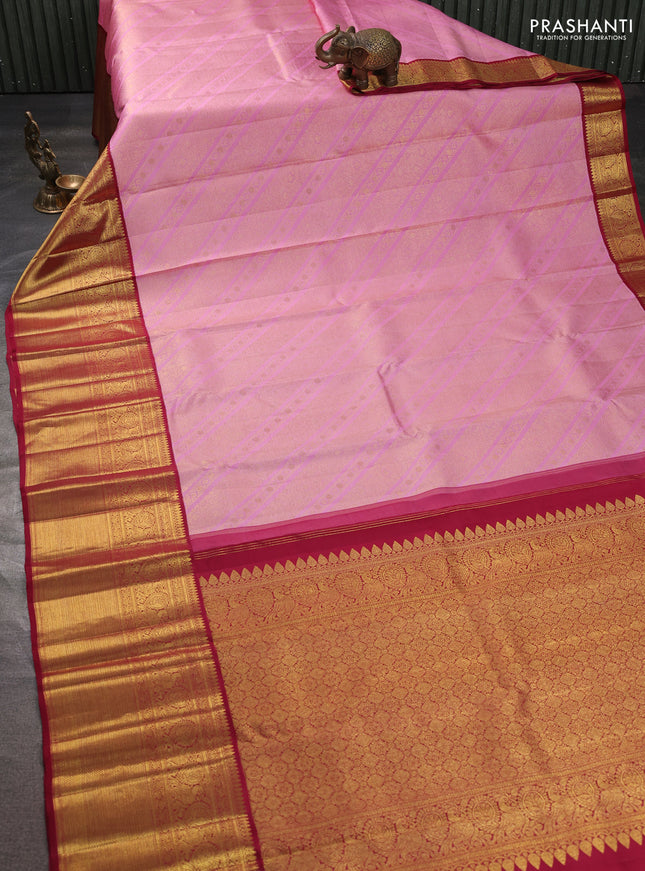 Pure kanchipuram silk saree light pink and maroon with allover zari woven brocade weaves and long zari woven border
