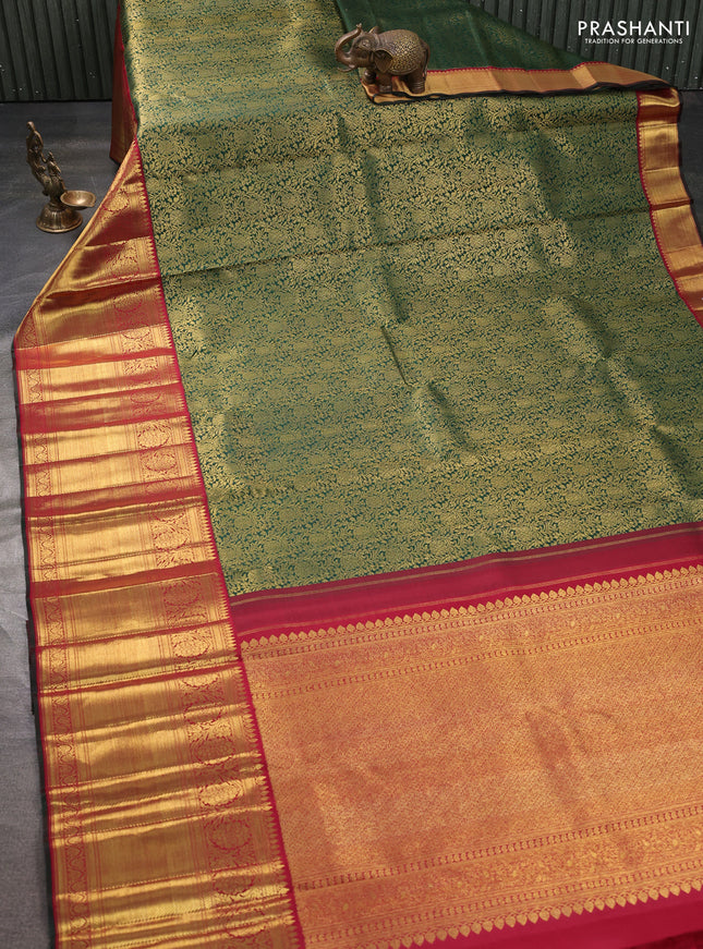 Pure kanchipuram silk saree bottle green and maroon with allover zari woven brocade weaves and long zari woven border