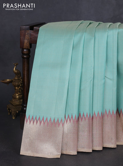 Pure kanchipuram silk saree teal blue and dual shade of magenta pink with allover small zari checked pattern and temple design zari woven border