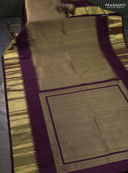 Pure kanchipuram silk saree deep purple with allover zari woven brocade weaves and temple design zari woven border