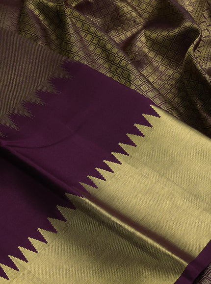 Pure kanchipuram silk saree deep purple with allover zari woven brocade weaves and temple design zari woven border