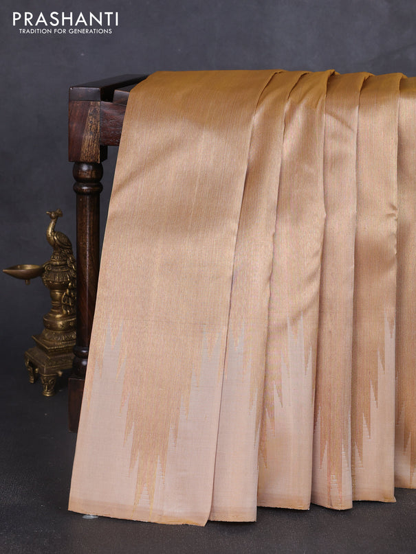 Pure kanchipuram tissue silk saree sandal and dual shade of pinkish orange with palin body and temple design border