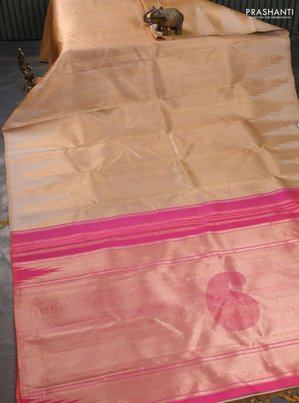 Pure kanchipuram tissue silk saree sandal and dual shade of pinkish orange with palin body and temple design border