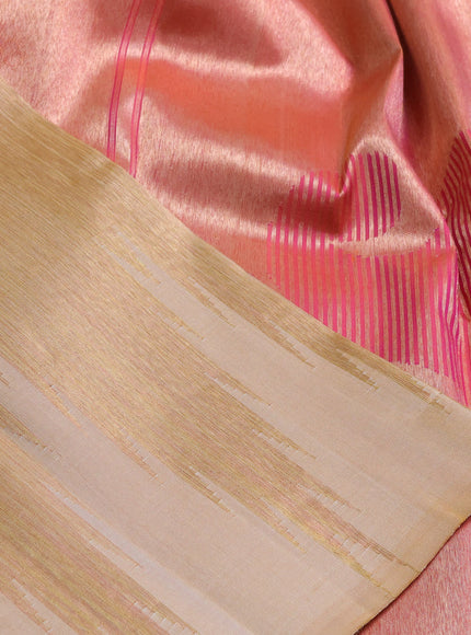 Pure kanchipuram tissue silk saree sandal and dual shade of pinkish orange with palin body and temple design border