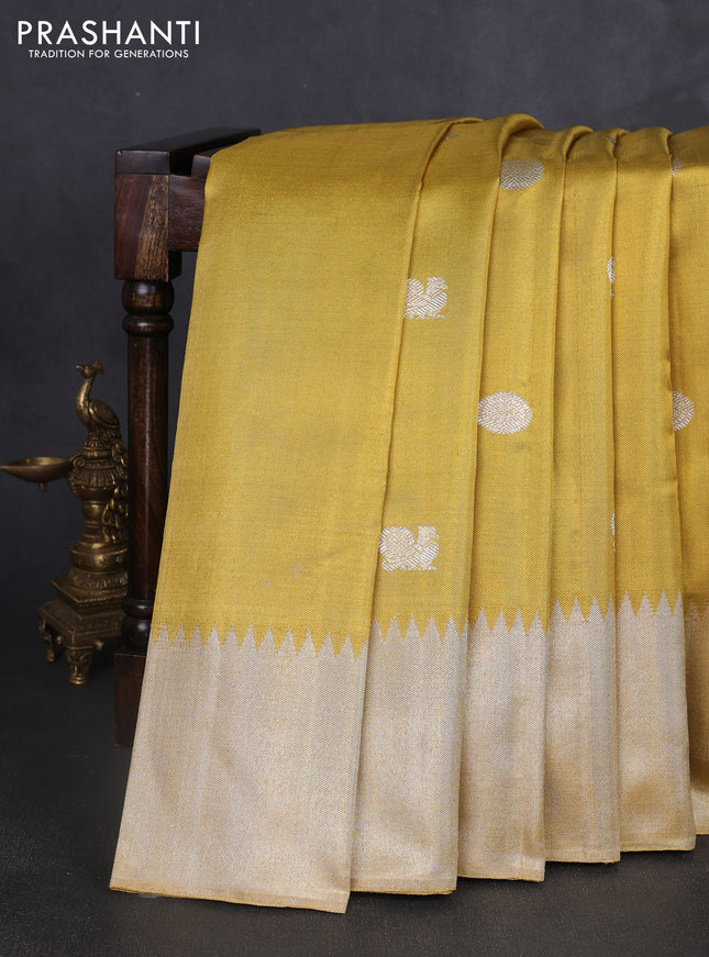 Kora kanchipuram silk saree gold with rudhraksha & annam silver zari woven buttas and long silver zari woven border