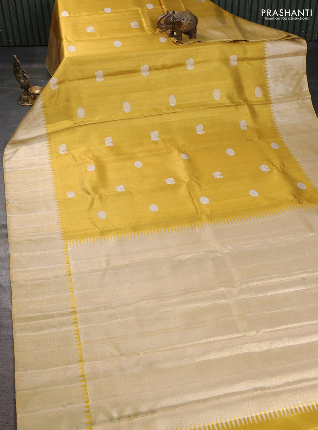 Kora kanchipuram silk saree gold with rudhraksha & annam silver zari woven buttas and long silver zari woven border