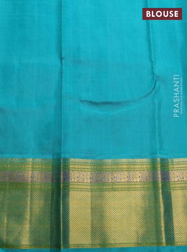 Kora kanchipuram silk saree cream and teal blue with zari woven buttas and rich zari woven border
