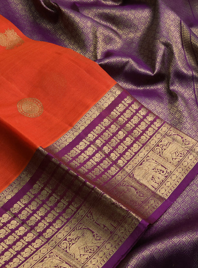 Kora kanchipuram silk saree orange and purple with rudhraksha & annam zari woven buttas and rich zari woven border