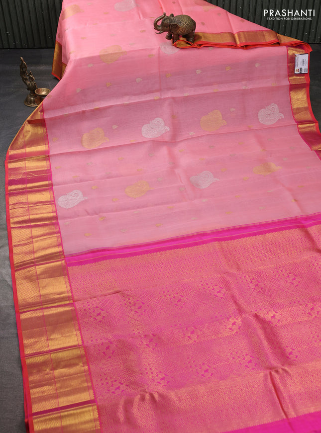 Kora kanchipuram silk saree peach pink and dual shade of pinkish orange with silver & gold zari woven buttas and zari woven border
