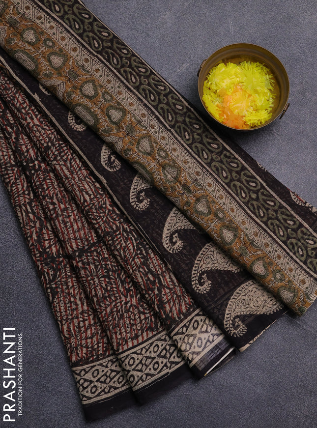 Kota doria saree rust shade and black with allover prints and printed border