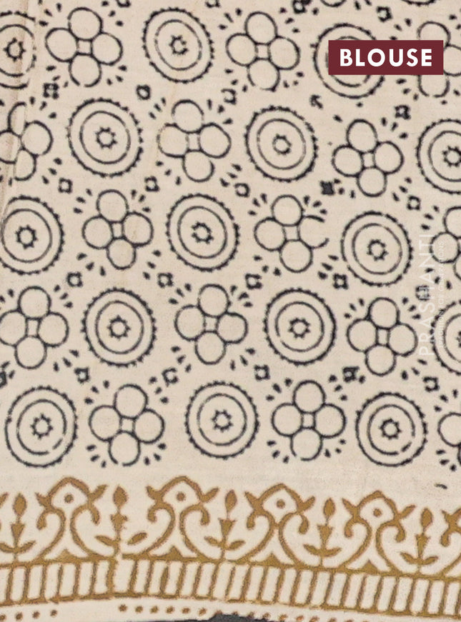 Kota doria saree rust shade and black with allover prints and printed border