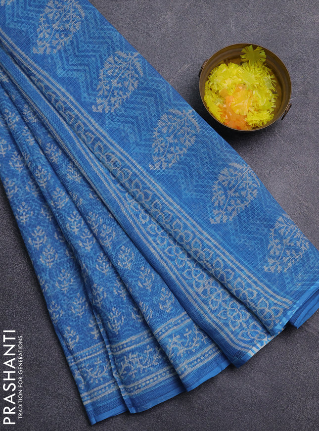 Kota doria saree cs blue with allover dabu prints and printed border