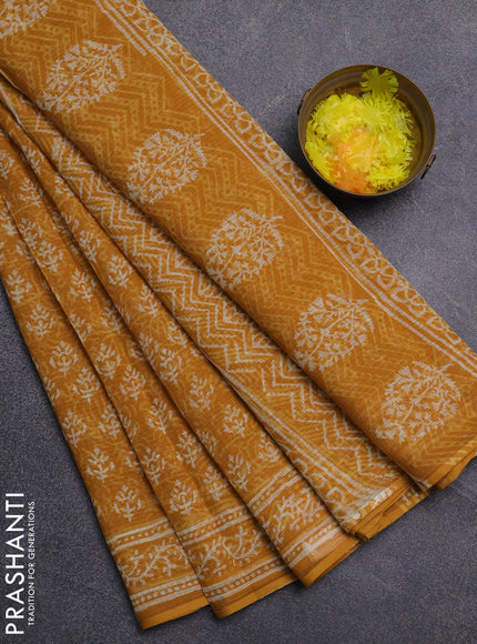 Kota doria saree mustard yellow with allover dabu prints and printed border