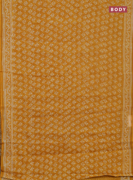 Kota doria saree mustard yellow with allover dabu prints and printed border