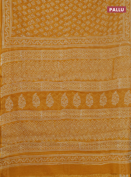 Kota doria saree mustard yellow with allover dabu prints and printed border