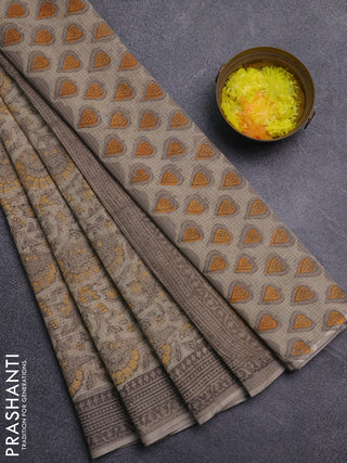 Kota doria saree beige and grey with allover prints and printed border