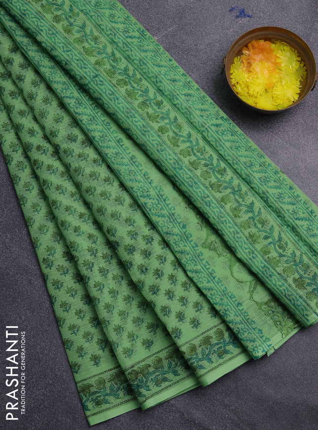 Kota doria saree light green with allover butta prints and printed border