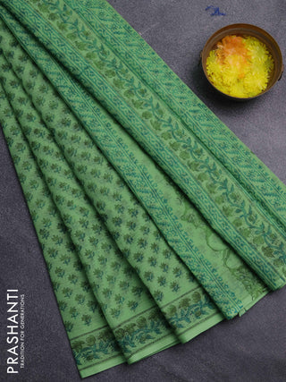 Kota doria saree light green with allover butta prints and printed border