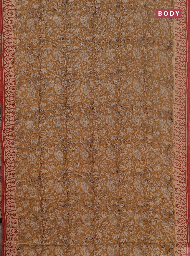 Kota doria saree mustard yellow and rust shade with allover prints and printed border