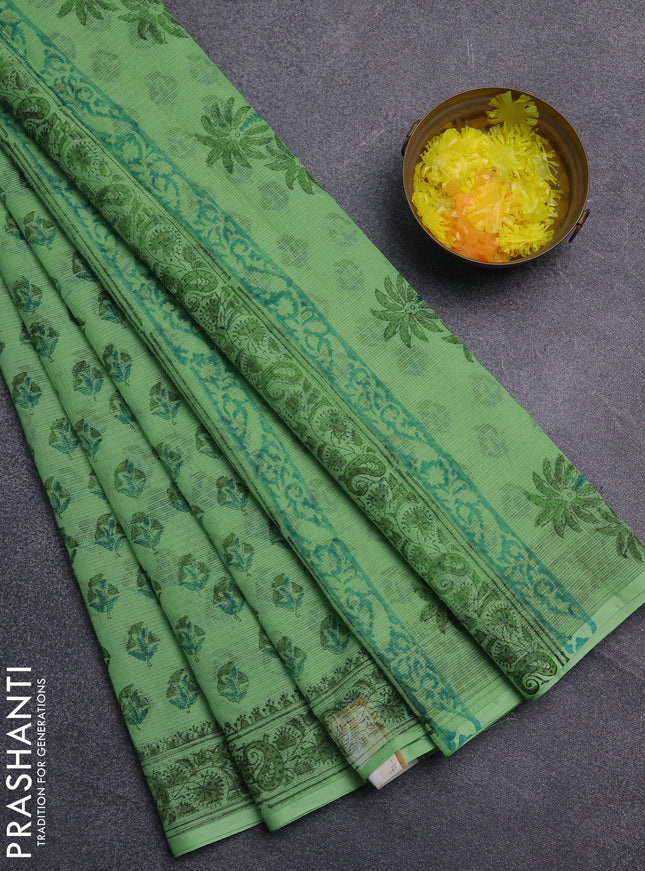 Kota doria saree light green with allover butta prints and printed border