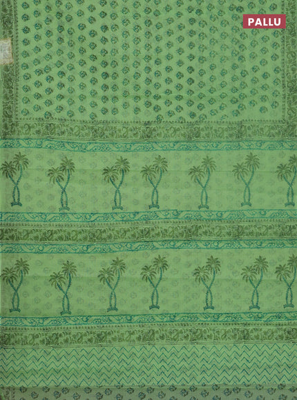 Kota doria saree light green with allover butta prints and printed border