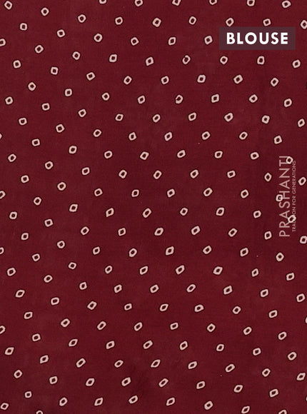 Kota doria saree maroon with allover geomatric prints and printed border