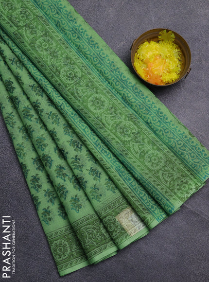 Kota doria saree light green with allover butta prints and printed border