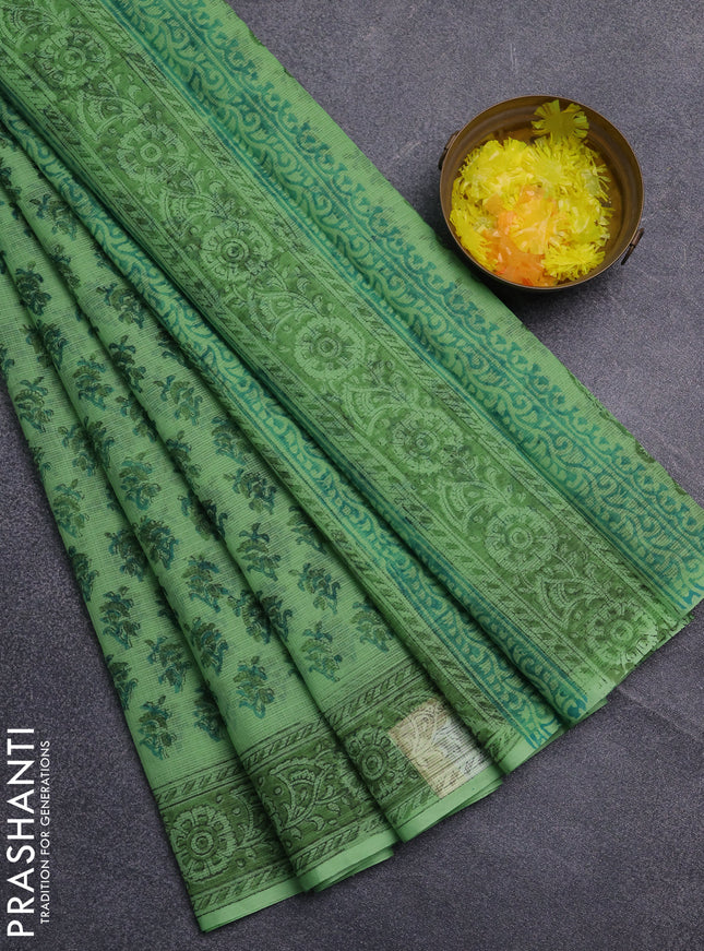 Kota doria saree light green with allover butta prints and printed border