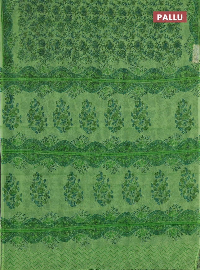 Kota doria saree light green with allover prints and printed border