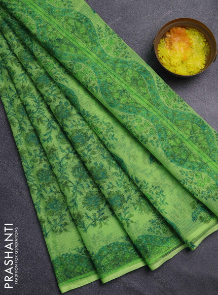 Kota doria saree light green with allover prints and printed border