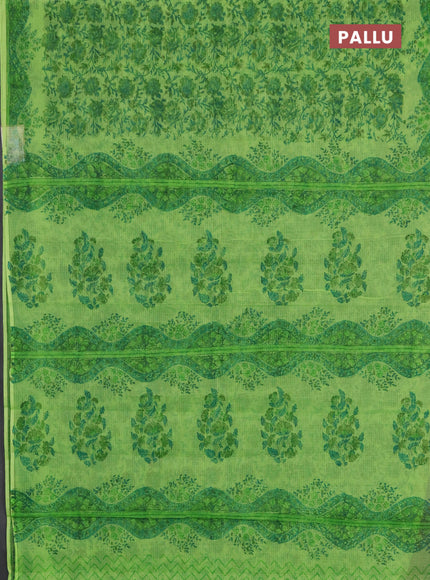 Kota doria saree light green with allover prints and printed border