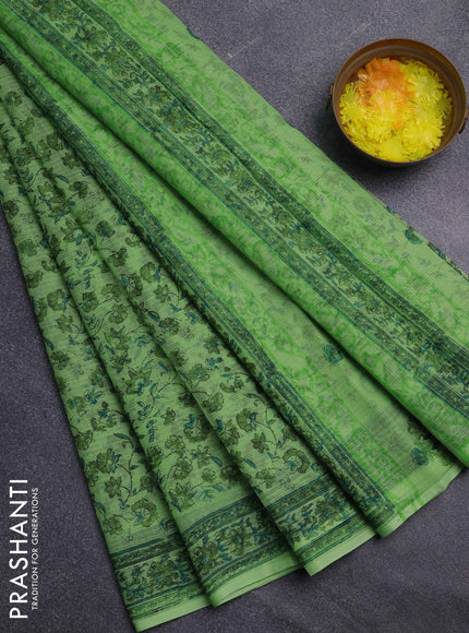 Kota doria saree light green with allover prints and printed border