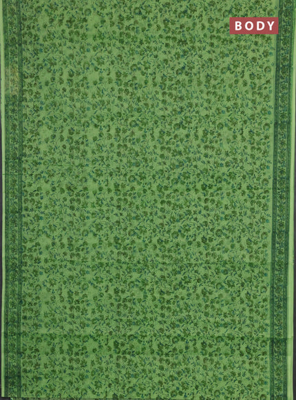 Kota doria saree light green with allover prints and printed border