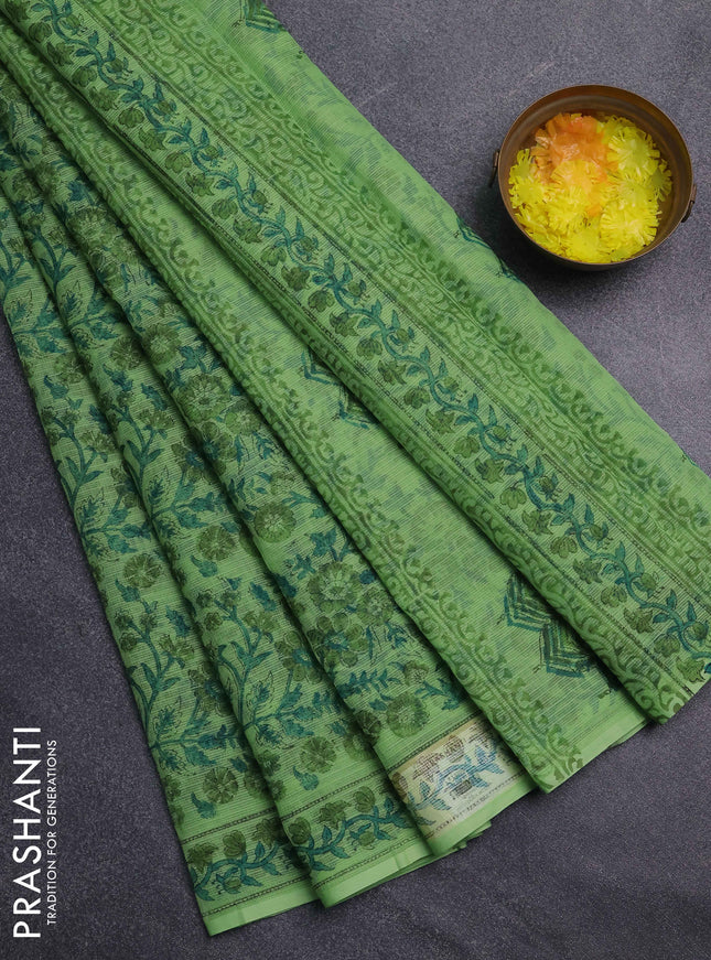 Kota doria saree light green with allover prints and printed border