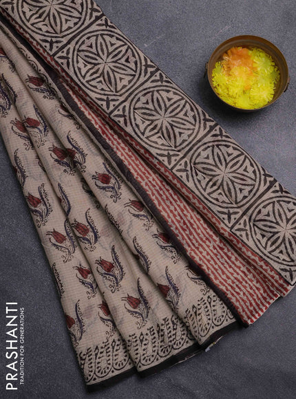 Kota doria saree beige and black with allover butta prints and printed border
