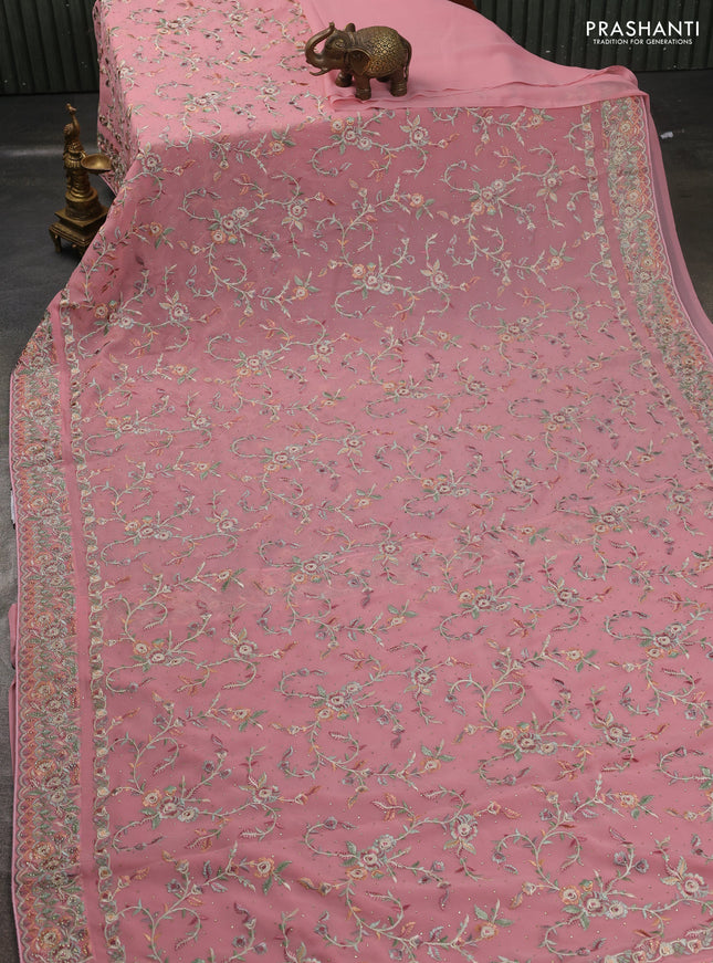 Georgette saree mauve pink with allover embroidery stone work and embroidery stone work border