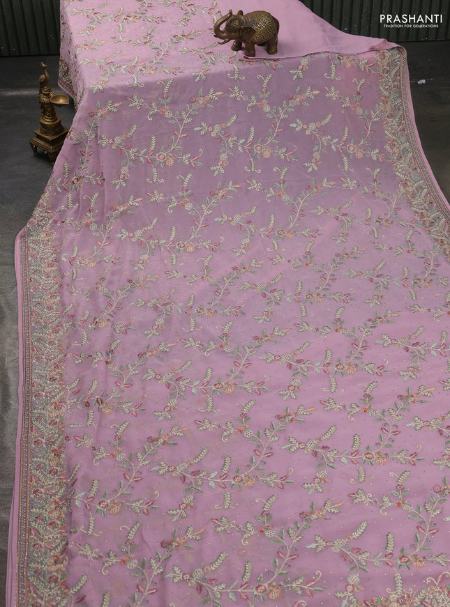 Georgette saree pastel pink with allover embroidery stone work and embroidery stone work border