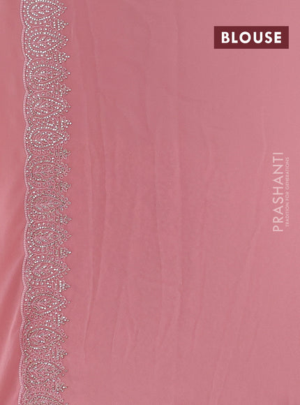 Georgette saree peach pink with allover embroidery work and stone work border