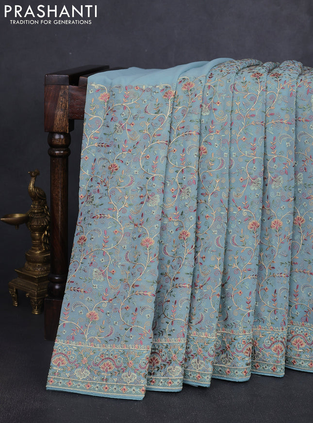 Georgette saree pastel blue with allover embroidery work and embroidery border