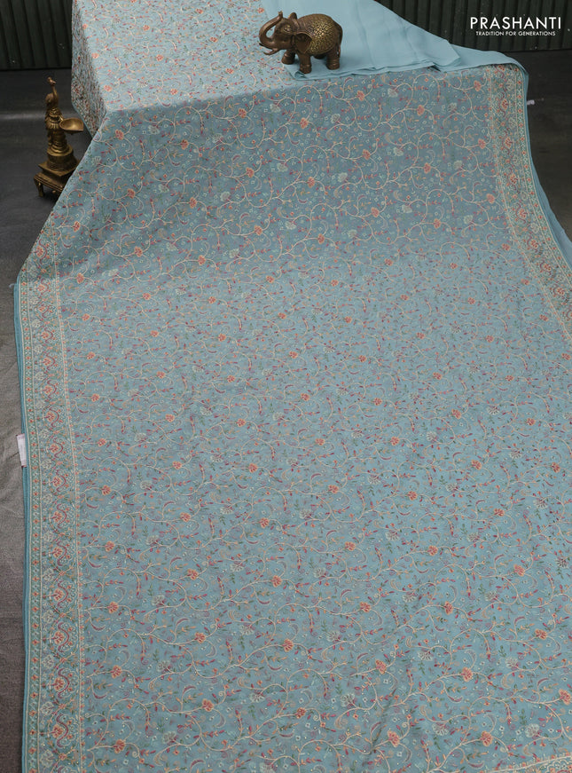 Georgette saree pastel blue with allover embroidery work and embroidery border