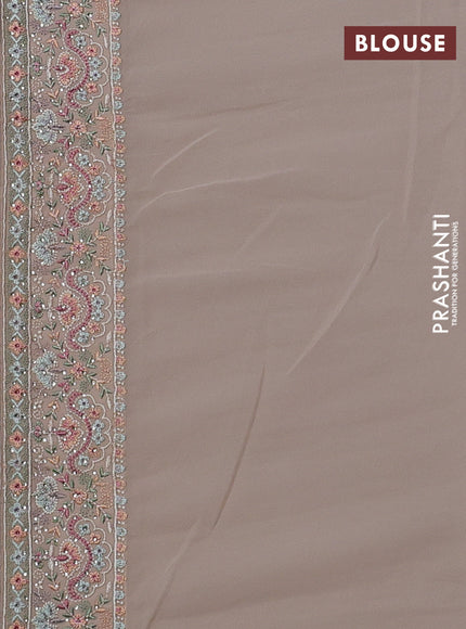 Georgette saree beige with allover embroidery work and embroidery border