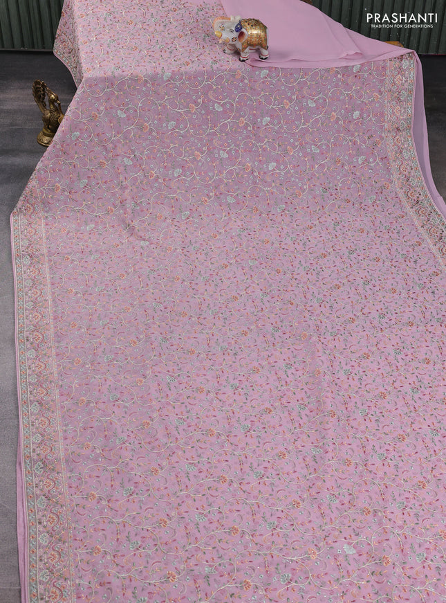 Georgette saree pastel pink with allover embroidery work and embroidery border