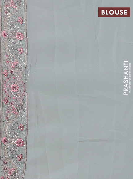 Georgette saree pastel green with allover paisley embroidery stone work