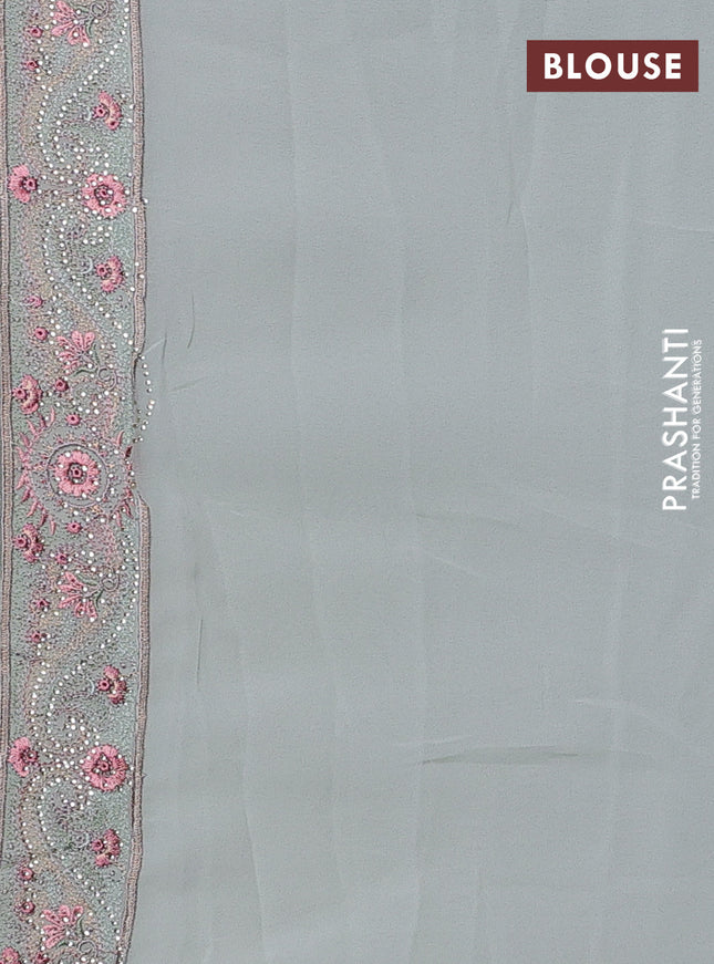 Georgette saree pastel green with allover paisley embroidery stone work