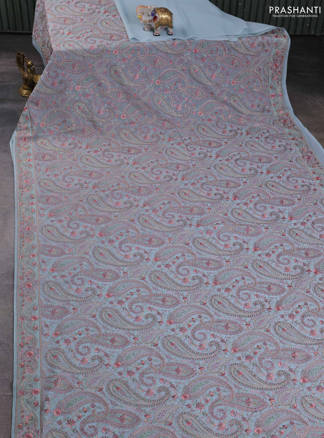 Georgette saree pastel blue with allover paisley embroidery stone work